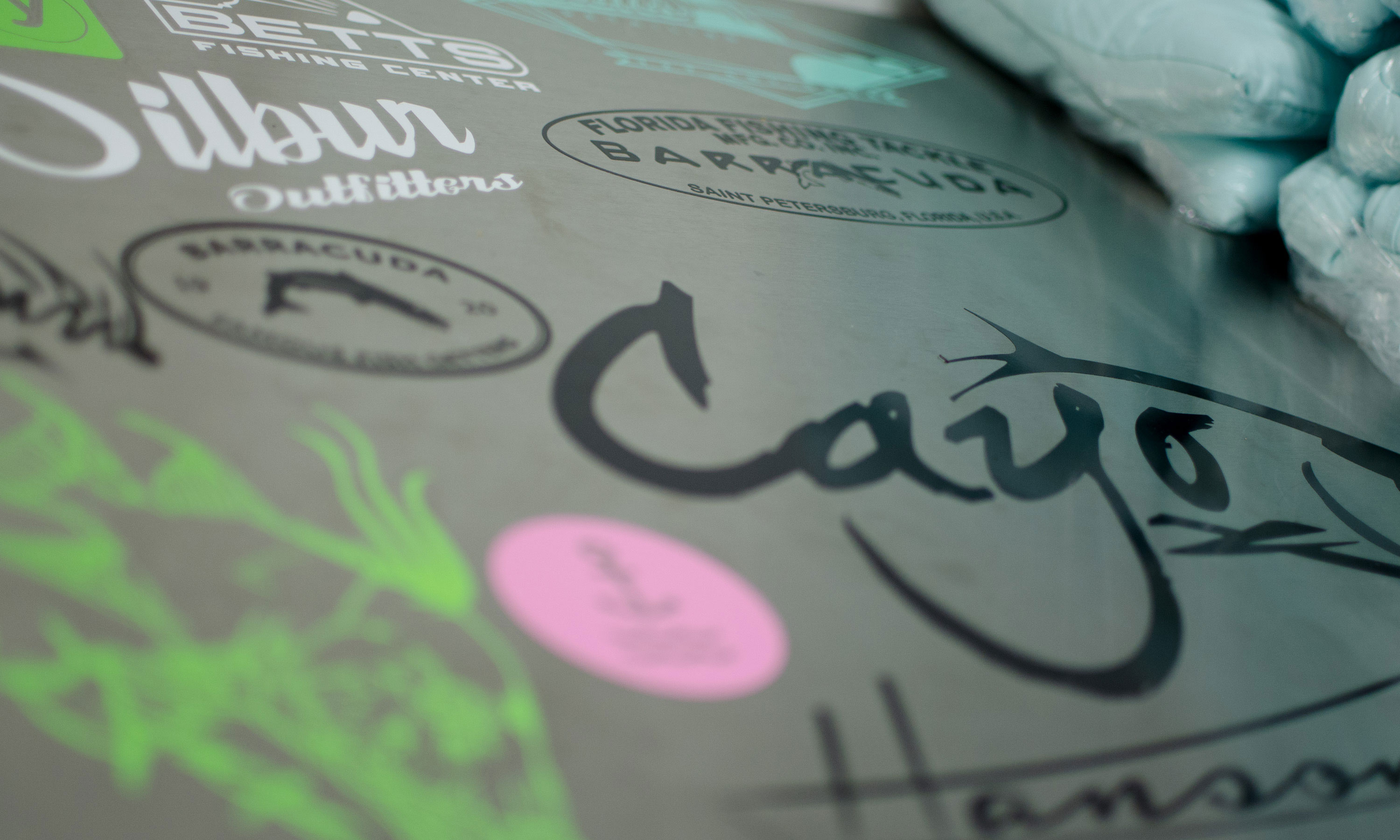 Closeup of various vinyl stickers on table